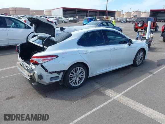 ✅ 2018 Toyota Camry LE • VIN: 4T1B11HK1JU047710 • Lot: 43482601. Listed on IAAI with 53,123 mi. Free auction sales archive from the USA and detailed vehicle history report at DreamBid. Image 4.