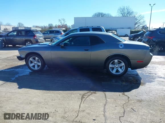 ✅ 2012 Dodge Challenger SXT • VIN: 2C3CDYAG9CH206661 • Lot: 41588889. Wystawiony na IAAI z przebiegiem 218 581 mil. Bezpłatny archiwum sprzedaży aukcyjnych z USA i szczegółowy raport historii pojazdu na DreamBid. Zdjęcie 14.