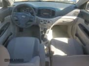 ✅ 2006 Hyundai Accent GLS • VIN: KMHCN46C56U042703 • Лот: 48938265. Опубликован ранее на Copart с пробегом 167 661 миль. Бесплатный доступ к архиву аукционных продаж из США и подробный отчёт об истории автомобиля на DreamBid. Изображение 8.