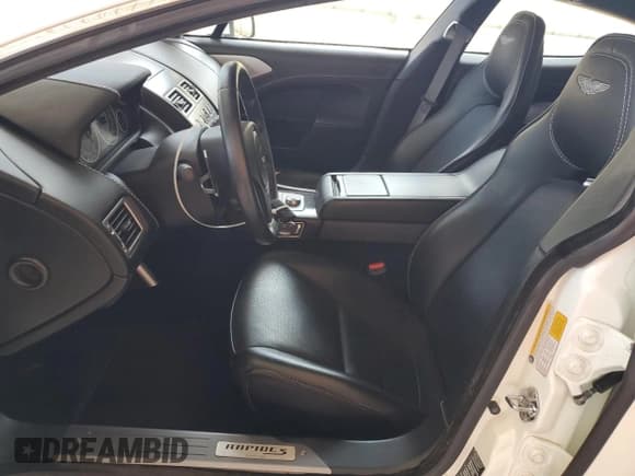 ✅ 2014 Aston Martin Rapide • VIN: SCFHDDAT7EGF03597 • Lot: 68367695. Listed on Copart with 55,540 mi. Free auction sales archive from the USA and detailed vehicle history report at DreamBid. Image 7.