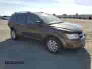 2017 Dodge Journey SE with VIN 3C4PDCAB3HT551168, listed as a Copart auction lot 71287445 with 148,553 mi miles and Salvage title. Bid and sale history available at DreamBid. Image 4.