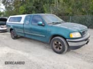 ✅ 1997 Ford F-150 XL • VIN: 1FTEX17L3VKC79253 • Lot: 71881195. Wystawiony na Copart z przebiegiem 263 893 mil. Bezpłatny archiwum sprzedaży aukcyjnych z USA i szczegółowy raport historii pojazdu na DreamBid. Zdjęcie 4.