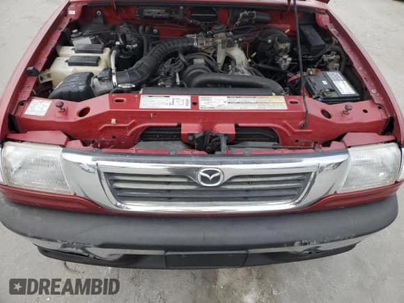 ✅ 2000 Mazda B-Series SX • VIN: 4F4YR12C2YTM30989 • Lot: 88946185. Listed on Copart with 250,368 mi. Free auction sales archive from the USA and detailed vehicle history report at DreamBid. Image 11.