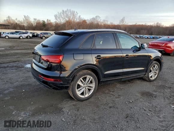 ✅ 2017 Audi Q3 Premium • VIN: WA1ECCFS0HR008799 • Lot: 94338625. Wystawiony na Copart z przebiegiem 126 660 mil. Bezpłatny archiwum sprzedaży aukcyjnych z USA i szczegółowy raport historii pojazdu na DreamBid. Zdjęcie 3.