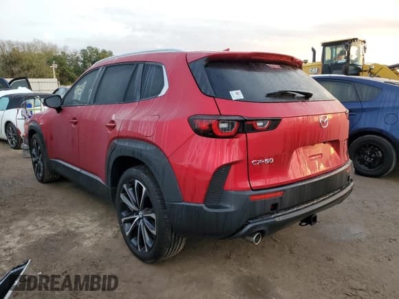 ✅ 2023 Mazda CX-50 S Premium Plus • VIN: 7MMVABEM3PN103159 • Лот: 73447152. Опубликован ранее на Copart с пробегом 9 459 миль. Бесплатный доступ к архиву аукционных продаж из США и подробный отчёт об истории автомобиля на DreamBid. Изображение 2.