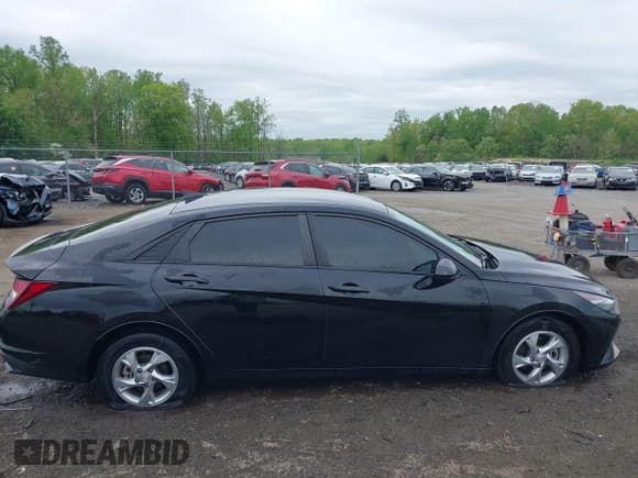 ✅ 2021 Hyundai Elantra SE • VIN: KMHLL4AGXMU105372 • Lot: 42045638. Listed on IAAI with 60,334 mi. Free auction sales archive from the USA and detailed vehicle history report at DreamBid. Image 14.