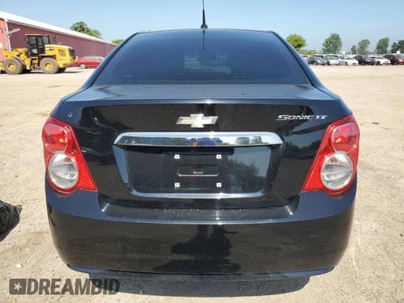 2012 Chevrolet Sonic LT z VIN 1G1JC5EH4C4192116, wystawiony jako Copart lot #65507715 z przebiegiem 101 011 mil mil oraz Szkoda całkowita • Salvage title. Historia ofert i sprzedaży dostępna na DreamBid. Obrazek 6.