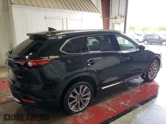 ✅ 2023 Mazda CX-9 Grand Touring • VIN: JM3TCBDY7P0649022 • Lot: 56946495. Wystawiony na Copart z przebiegiem 52 587 mil. Bezpłatny archiwum sprzedaży aukcyjnych z USA i szczegółowy raport historii pojazdu na DreamBid. Zdjęcie 3.