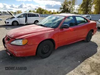 ✅ 2005 Pontiac Grand Am SE • VIN: 1G2NE52E85M199557 • Лот: 65885865. Опубликован ранее на Copart с пробегом 148 174 миль. Бесплатный доступ к архиву аукционных продаж из США и подробный отчёт об истории автомобиля на DreamBid. Изображение 1.
