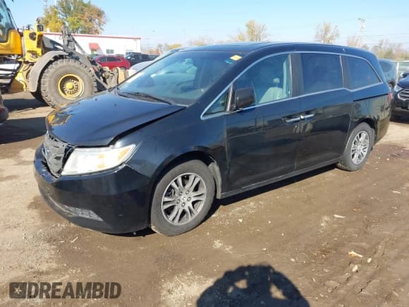 ✅ 2012 Honda Odyssey EX-L • VIN: 5FNRL5H60CB140575 • Lot: 43605156. Listed on IAAI with Not provided. Free auction sales archive from the USA and detailed vehicle history report at DreamBid. Image 2.