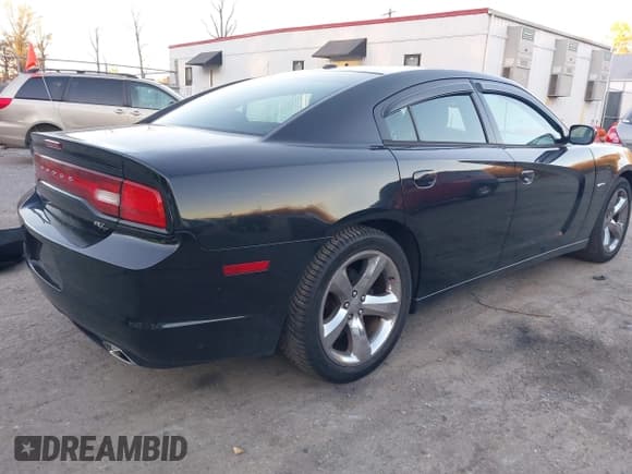 ✅ 2014 Dodge Charger RT • VIN: 2C3CDXCT4EH114753 • Lot: 43707418. Listed on IAAI with 172,479 mi. Free auction sales archive from the USA and detailed vehicle history report at DreamBid. Image 4.