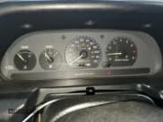 ✅ 1995 Ford Escort LX • VIN: 3FASP13J7SR205967 • Лот: 73087444. Опубликован ранее на Copart с пробегом 100 401 миль. Бесплатный доступ к архиву аукционных продаж из США и подробный отчёт об истории автомобиля на DreamBid. Изображение 9.