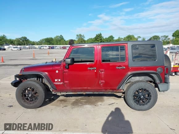 ✅ 2007 Jeep Wrangler X • VIN: 1J4GA39167L107341 • Lot: 43072556. Listed on IAAI with Not provided. Free auction sales archive from the USA and detailed vehicle history report at DreamBid. Image 14.