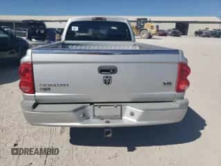 2005 Dodge Dakota z VIN 1D7HW52N95S257022, wystawiony jako Copart lot #77284684 z przebiegiem 204 724 mil mil oraz Czysty tytuł • Clean title. Historia ofert i sprzedaży dostępna na DreamBid. Obrazek 6.