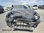 ✅ 2017 MINI Clubman Cooper • VIN: WMWLU1C52H2F26855 • Lot: 80100905. Wystawiony na Copart z przebiegiem 102 402 mil. Bezpłatny archiwum sprzedaży aukcyjnych z USA i szczegółowy raport historii pojazdu na DreamBid. Zdjęcie 5.