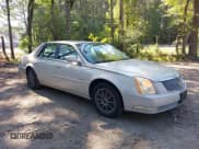 ✅ 2008 Cadillac DTS 1SC • VIN: 1G6KD57Y38U125930 • Lot: 43302798. Listed on IAAI with 101,130 mi. Free auction sales archive from the USA and detailed vehicle history report at DreamBid. Image 1.