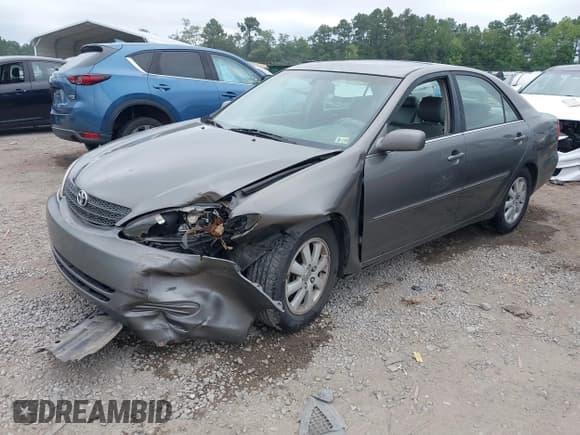 ✅ 2002 Toyota Camry XLE • VIN: 4T1BF30K32U532358 • Lot: 42929205. Listed on IAAI with 69,707 mi. Free auction sales archive from the USA and detailed vehicle history report at DreamBid. Image 17.
