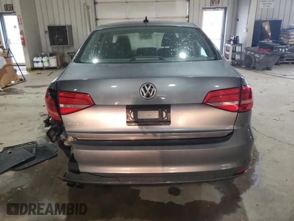 ✅ 2015 Volkswagen Jetta S • VIN: 3VW1K7AJ0FM245057 • Лот: 91980245. Опубликован ранее на Copart с пробегом 130 346 миль. Бесплатный доступ к архиву аукционных продаж из США и подробный отчёт об истории автомобиля на DreamBid. Изображение 6.
