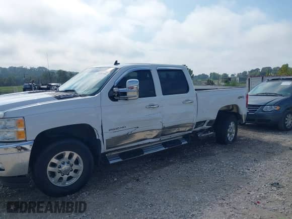 2013 Chevrolet Silverado 2500HD LTZ with VIN 1GC1KYCG7DF151006, listed as a IAAI auction lot 43263484 with 129,989 mi miles and . Bid and sale history available at DreamBid. Image 6.