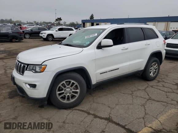 ✅ 2018 Jeep Grand Cherokee Laredo E • VIN: 1C4RJFAG4JC457350 • Lot: 82081045. Listed on Copart with 113,471 mi. Free auction sales archive from the USA and detailed vehicle history report at DreamBid. Image 1.