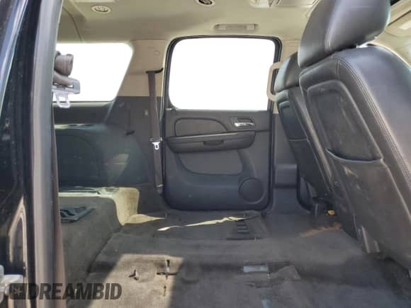 2013 Chevrolet Suburban LT с VIN 1GNSKJE79DR169165, выставлен на аукционе Copart как лот 89437395 с пробегом 314 051 миль миль и Списание • Salvage title. История ставок и продаж доступна на DreamBid. Изображение 11.