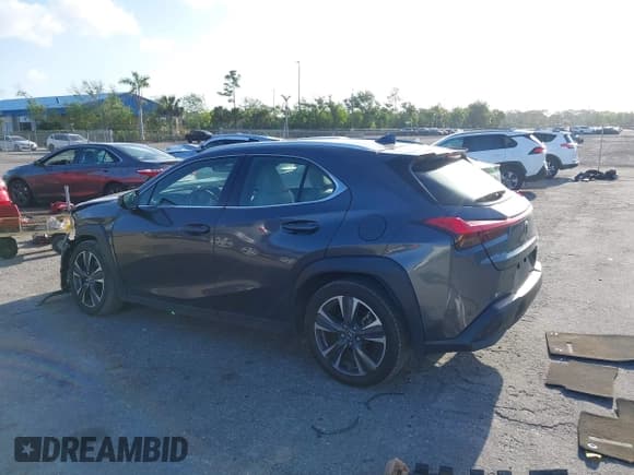 ✅ 2022 Lexus UX 200 • VIN: JTHX3JBH3N2051968 • Lot: 41965962. Wystawiony na IAAI z przebiegiem 12 722 mil. Bezpłatny archiwum sprzedaży aukcyjnych z USA i szczegółowy raport historii pojazdu na DreamBid. Zdjęcie 3.