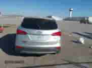 2016 Hyundai Santa Fe z VIN 5XYZTDLB8GG351827, wystawiony jako IAAI lot #43425613 z przebiegiem 145 079 mil mil oraz . Historia ofert i sprzedaży dostępna na DreamBid. Obrazek 17.