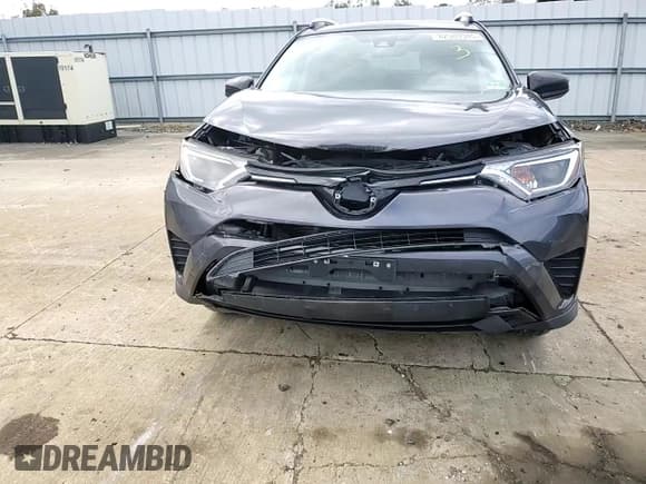 ✅ 2018 Toyota RAV4 LE • VIN: JTMBFREV2JJ746042 • Lot: 82589945. Listed on Copart with 134,958 mi. Free auction sales archive from the USA and detailed vehicle history report at DreamBid. Image 14.