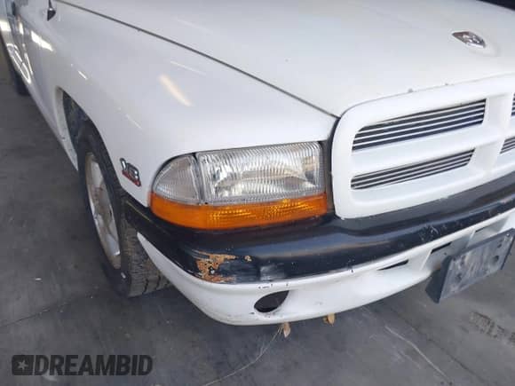 1997 Dodge Dakota z VIN 1B7GL23Y3VS185496, wystawiony jako IAAI lot #42538572 z przebiegiem 165 756 mil mil oraz . Historia ofert i sprzedaży dostępna na DreamBid. Obrazek 6.