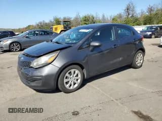 ✅ 2013 Kia Rio SX • VIN: KNADN5A34D6129822 • Lot: 80311235. Listed on Copart with 97,909 mi. Free auction sales archive from the USA and detailed vehicle history report at DreamBid. Image 1.