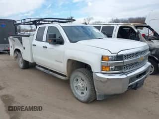 ✅ 2019 Chevrolet Silverado 2500HD Work Truck • VIN: 2GB2KREG9K1210329 • Lot: 41363453. Listed on IAAI with 136,023 mi. Free auction sales archive from the USA and detailed vehicle history report at DreamBid. Image 1.