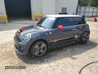 2013 MINI Hardtop John Cooper Works с VIN WMWSU9C53DT722265, выставлен на аукционе Copart как лот 59310535 с пробегом 129 589 миль миль и Списание • Salvage title. История ставок и продаж доступна на DreamBid. Изображение 1.