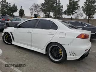 ✅ 2015 Mitsubishi Lancer Evolution MR • VIN: JA32W5FV5FU005248 • Lot: 53923665. Listed on Copart with 105,582 mi. Free auction sales archive from the USA and detailed vehicle history report at DreamBid. Image 2.