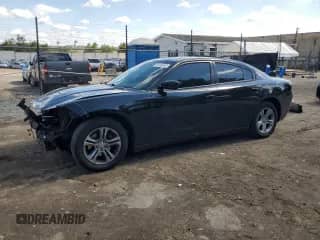 2021 Dodge Charger SXT с VIN 2C3CDXBG2MH646814, выставлен на аукционе Copart как лот 81434655 с пробегом 70 026 миль миль и Списание • Salvage title. История ставок и продаж доступна на DreamBid. Изображение 1.