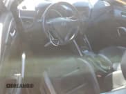 ✅ 2016 Hyundai Veloster Turbo R-Spec • VIN: KMHTC6AE7GU272917 • Lot: 81674234. Wystawiony na Copart z przebiegiem 89 191 mil. Bezpłatny archiwum sprzedaży aukcyjnych z USA i szczegółowy raport historii pojazdu na DreamBid. Zdjęcie 8.