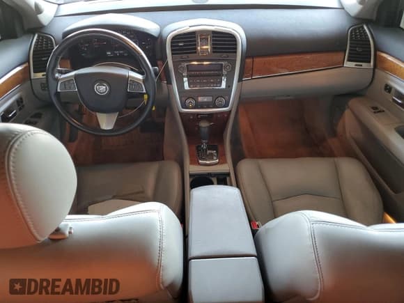 ✅ 2008 Cadillac SRX AWD • VIN: 1GYEE637380103308 • Lot: 73293534. Listed on Copart with 132,539 mi. Free auction sales archive from the USA and detailed vehicle history report at DreamBid. Image 8.