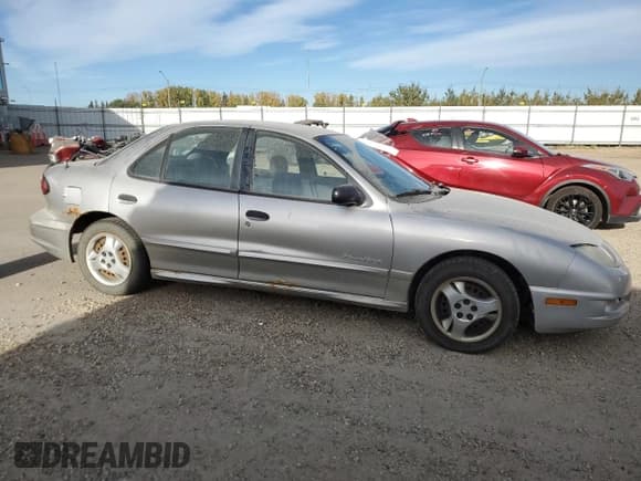 ✅ 2005 Pontiac Sunfire SL • VIN: 3G2JB52F35S123339 • Lot: 81781215. Wystawiony na Copart z przebiegiem 206 324 mil. Bezpłatny archiwum sprzedaży aukcyjnych z USA i szczegółowy raport historii pojazdu na DreamBid. Zdjęcie 4.
