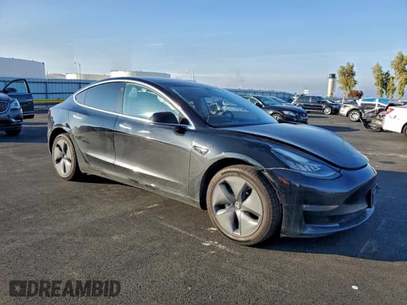 ✅ 2019 Tesla Model 3 Mid Range • VIN: 5YJ3E1EA7KF394798 • Лот: 93985265. Опубликован ранее на Copart с пробегом 163 543 миль. Бесплатный доступ к архиву аукционных продаж из США и подробный отчёт об истории автомобиля на DreamBid. Изображение 4.