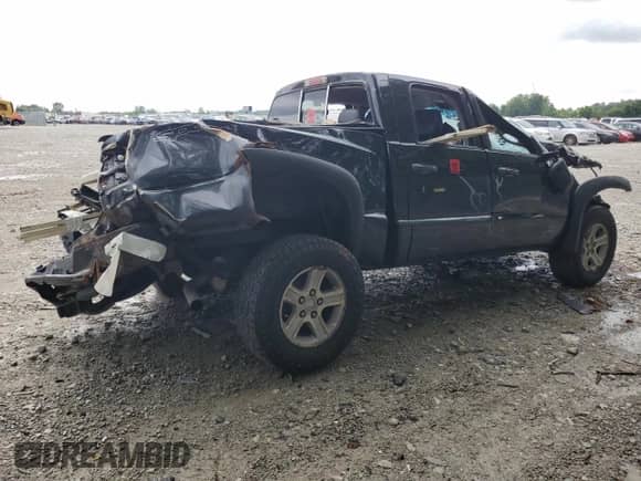2008 Dodge Dakota z VIN 1D7HE68K78S548080, wystawiony jako Copart lot #65774374 z przebiegiem 103 736 mil mil oraz Szkoda całkowita • Salvage title. Historia ofert i sprzedaży dostępna na DreamBid. Obrazek 3.