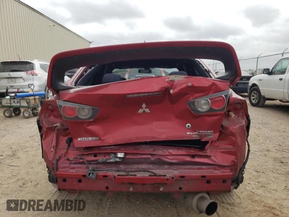 ✅ 2015 Mitsubishi Lancer Evolution Final Edition • VIN: JA32W7FV9FU028429 • Лот: 52341344. Опубликован ранее на Copart с пробегом 49 982 миль. Бесплатный доступ к архиву аукционных продаж из США и подробный отчёт об истории автомобиля на DreamBid. Изображение 6.