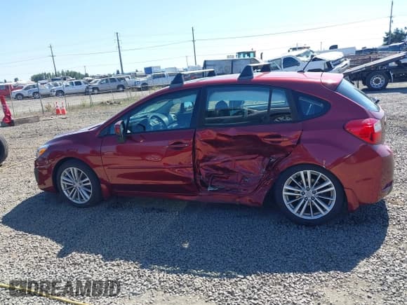✅ 2012 Subaru Impreza Premium • VIN: JF1GPAD62CH210772 • Lot: 42539790. Listed on IAAI with 102,298 mi. Free auction sales archive from the USA and detailed vehicle history report at DreamBid. Image 14.