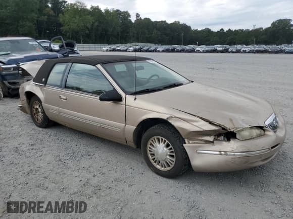 ✅ 1997 Mercury Cougar • VIN: 1MELM6245VH603795 • Лот: 70293355. Опубликован ранее на Copart с пробегом 99 536 миль. Бесплатный доступ к архиву аукционных продаж из США и подробный отчёт об истории автомобиля на DreamBid. Изображение 4.