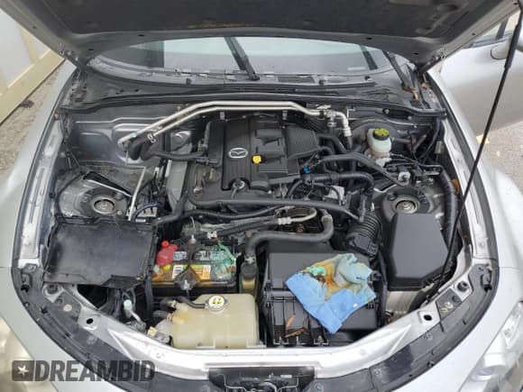 ✅ 2010 Mazda MX-5 Miata Touring • VIN: JM1NC2EF1A0208184 • Лот: 74772614. Опубликован ранее на Copart с пробегом Не указан. Бесплатный доступ к архиву аукционных продаж из США и подробный отчёт об истории автомобиля на DreamBid. Изображение 11.