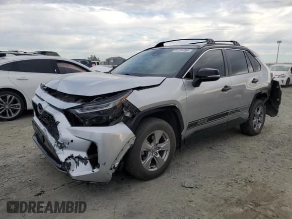 ✅ 2022 Toyota RAV4 Hybrid XSE • VIN: 4T3E6RFV1NU090113 • Лот: 91294395. Опубликован ранее на Copart с пробегом 208 275 миль. Бесплатный доступ к архиву аукционных продаж из США и подробный отчёт об истории автомобиля на DreamBid. Изображение 1.