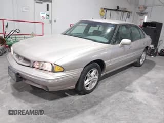✅ 1999 Pontiac Bonneville SE • VIN: 1G2HX52K6XH219099 • Lot: 43634147. Wystawiony na IAAI z przebiegiem 103 457 mil. Bezpłatny archiwum sprzedaży aukcyjnych z USA i szczegółowy raport historii pojazdu na DreamBid. Zdjęcie 2.