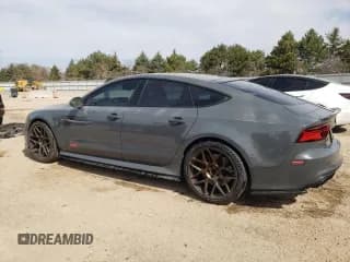✅ 2016 Audi RS 7 Prestige • VIN: WUAW2AFC2GN901494 • Лот: 52958345. Опубликован ранее на Copart с пробегом 99 718 миль. Бесплатный доступ к архиву аукционных продаж из США и подробный отчёт об истории автомобиля на DreamBid. Изображение 2.