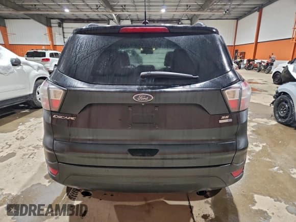 ✅ 2017 Ford Escape SE • VIN: 1FMCU9G93HUD79912 • Lot: 95486905. Wystawiony na Copart z przebiegiem 250 226 mil. Bezpłatny archiwum sprzedaży aukcyjnych z USA i szczegółowy raport historii pojazdu na DreamBid. Zdjęcie 6.