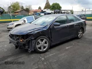 2014 Toyota Camry L with VIN 4T1BF1FK4EU304191, listed as a Copart auction lot 70778585 with 176,301 mi miles and Salvage title. Bid and sale history available at DreamBid. Image 1.