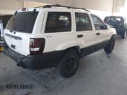 ✅ 2000 Jeep Grand Cherokee Laredo • VIN: 1J4GW48S3YC197566 • Лот: 43783685. Опубликован ранее на IAAI с пробегом 257 472 миль. Бесплатный доступ к архиву аукционных продаж из США и подробный отчёт об истории автомобиля на DreamBid. Изображение 4.