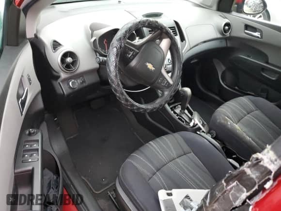 2016 Chevrolet Sonic LT z VIN 1G1JC6SB5G4175014, wystawiony jako Copart lot #74584614 z przebiegiem Nie podano mil oraz Szkoda całkowita • Salvage title. Historia ofert i sprzedaży dostępna na DreamBid. Obrazek 8.